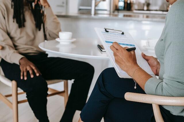 two people in a tenant screening interview